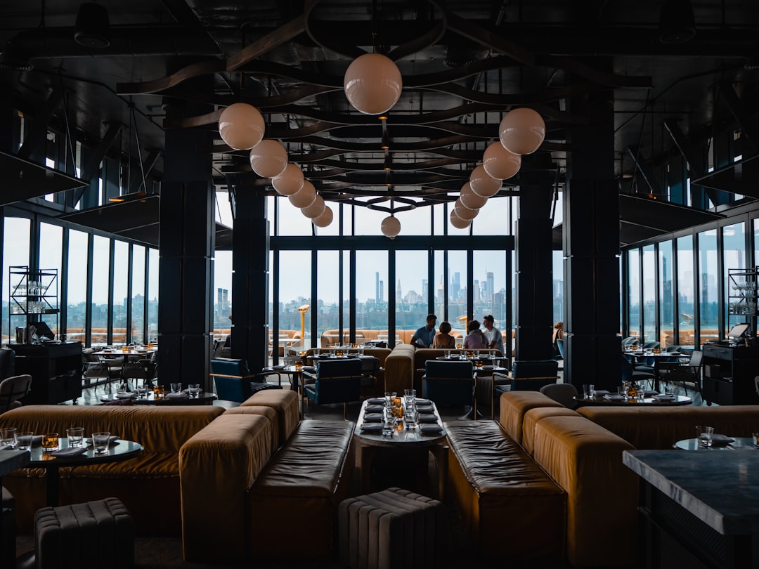 Sophisticated fine dining restaurant interior with warm ambient lighting