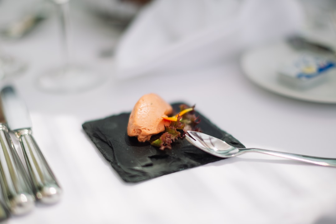 Sophisticated culinary plating with warm editorial lighting