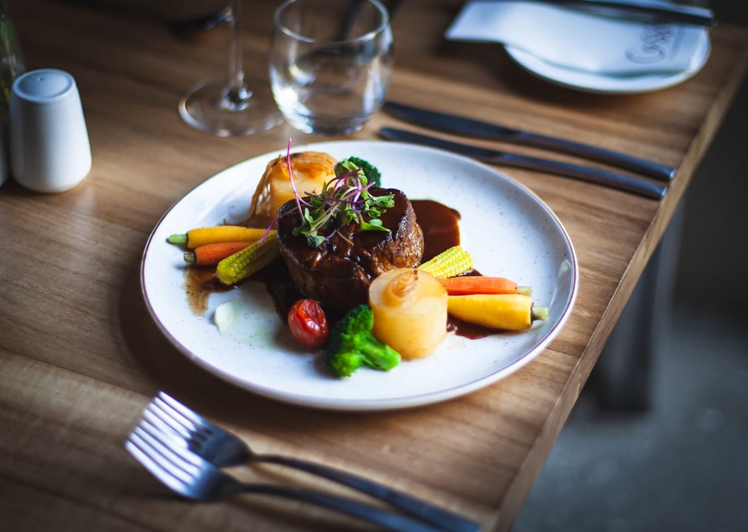 Gourmet plated cuisine with editorial styling